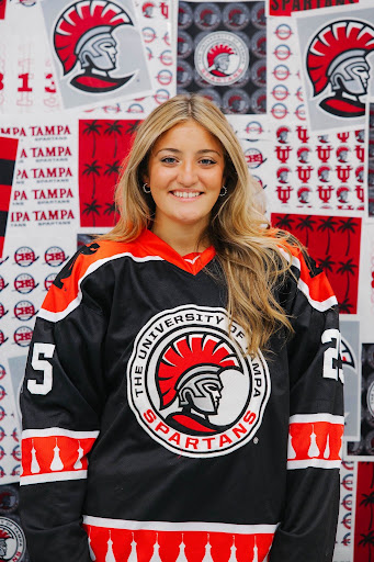 Avery Gugliotta wearing her University of Tampa hockey jersey