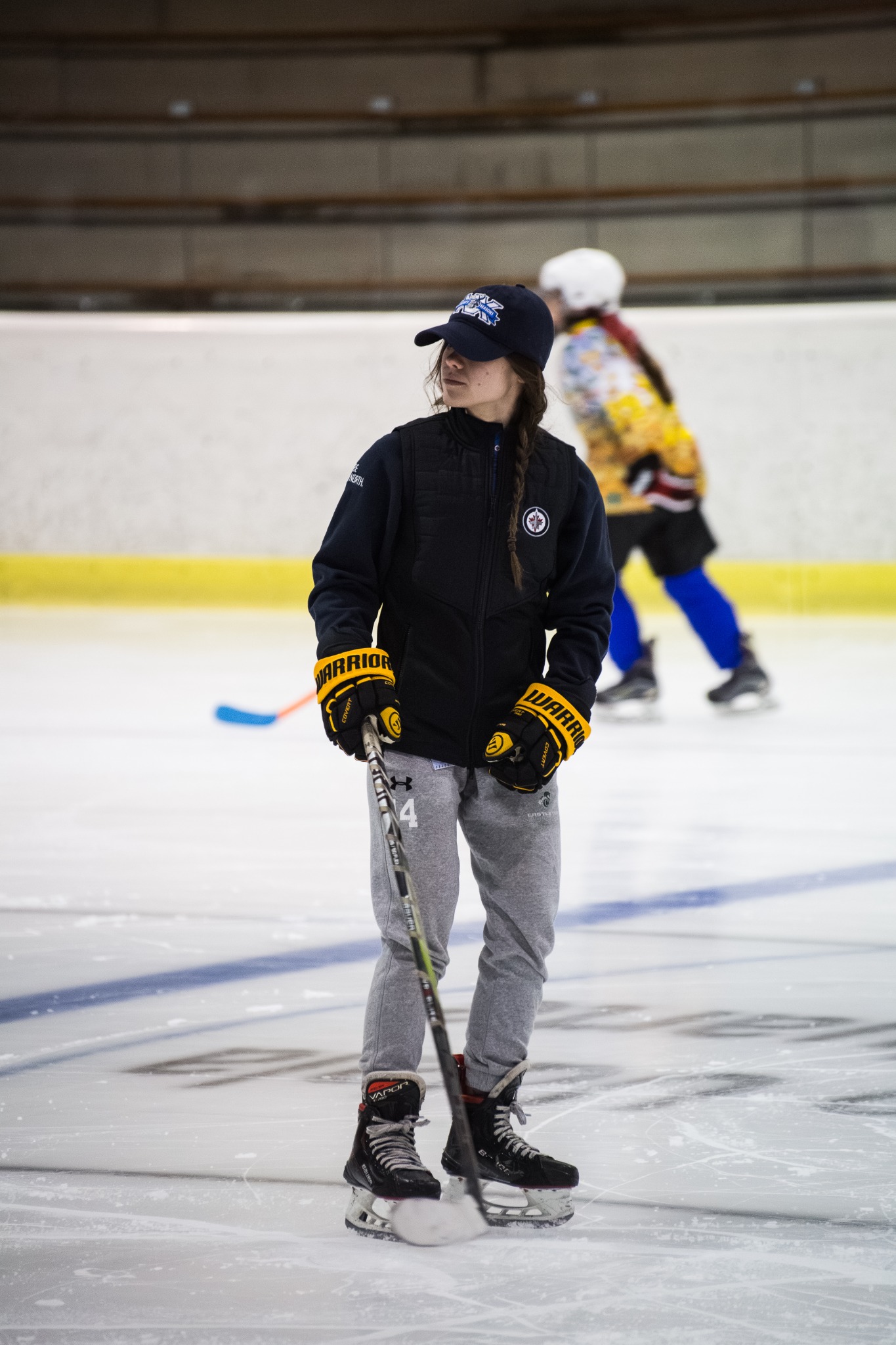 Sara Molina coaching on the ice